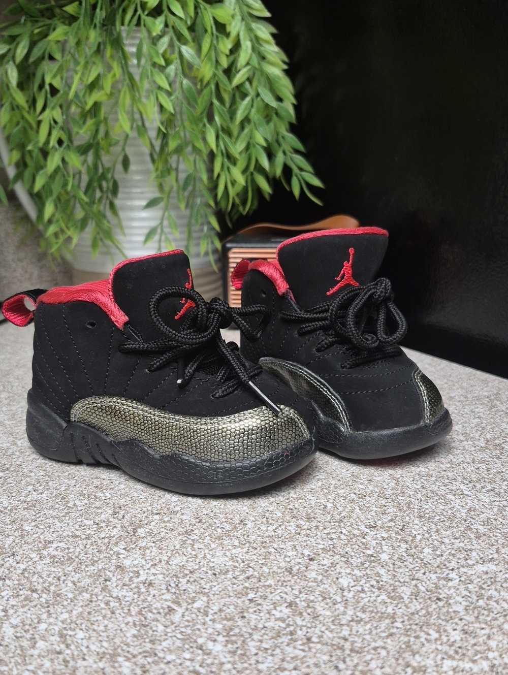Jordan Kids Black and Red High-Top Sneakers with Gold Accents